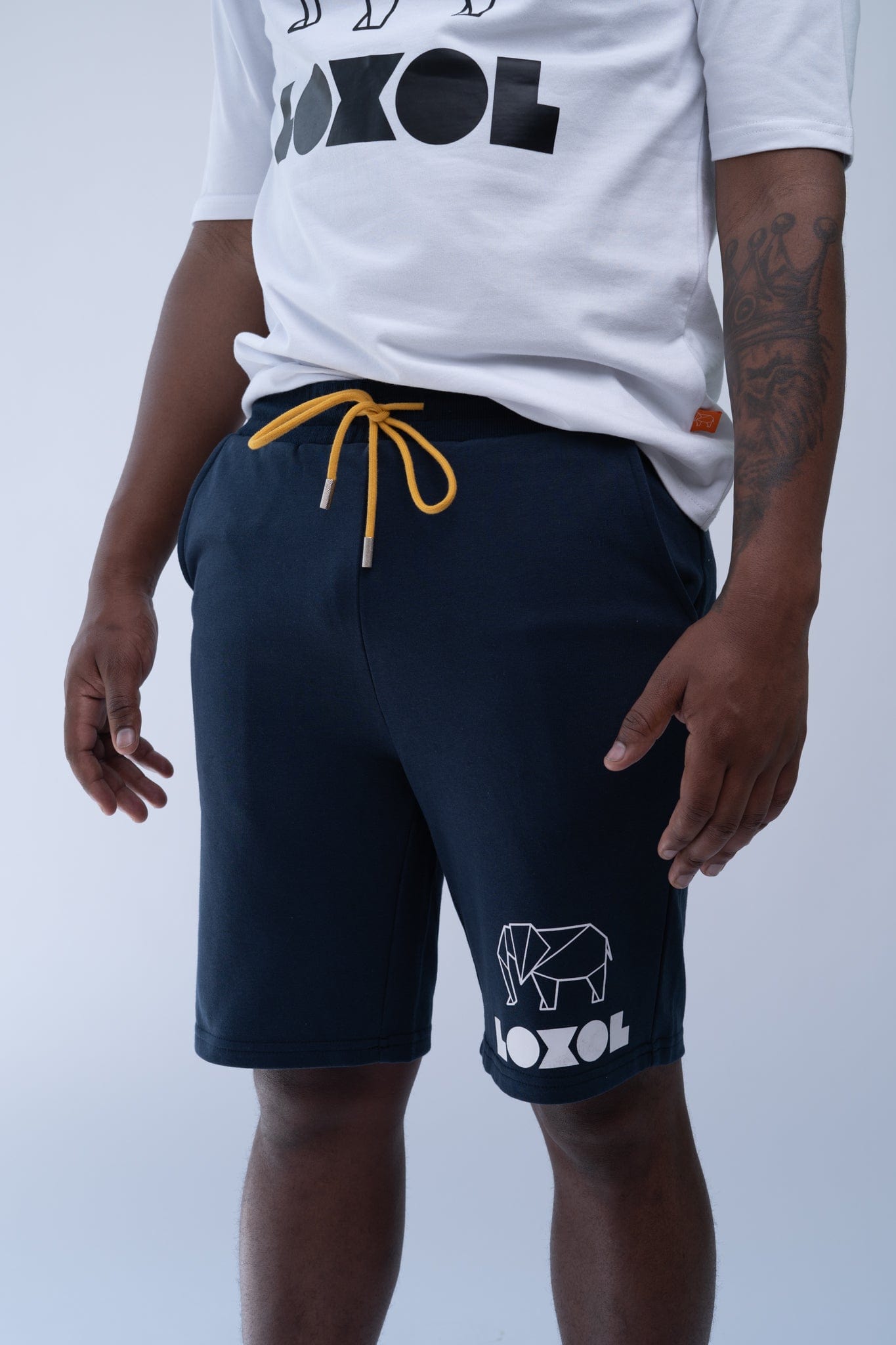white graphic shorts
